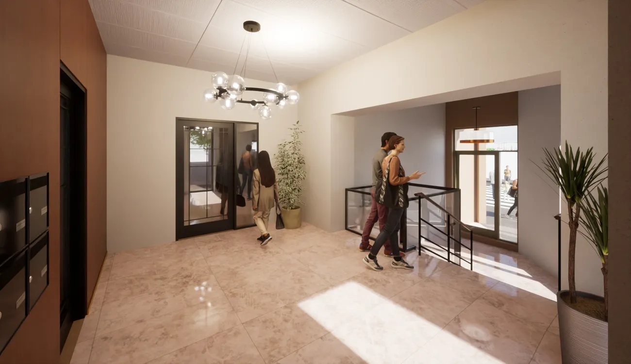 Entrée d'un immeuble moderne du projet immobilier La Belle Époque à Roanne, avec des éléments de design élégant.